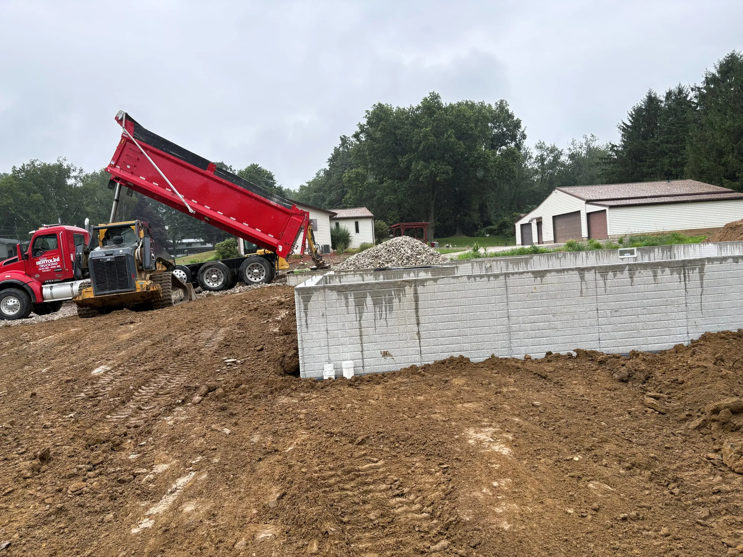 Backfill around new foundation walls