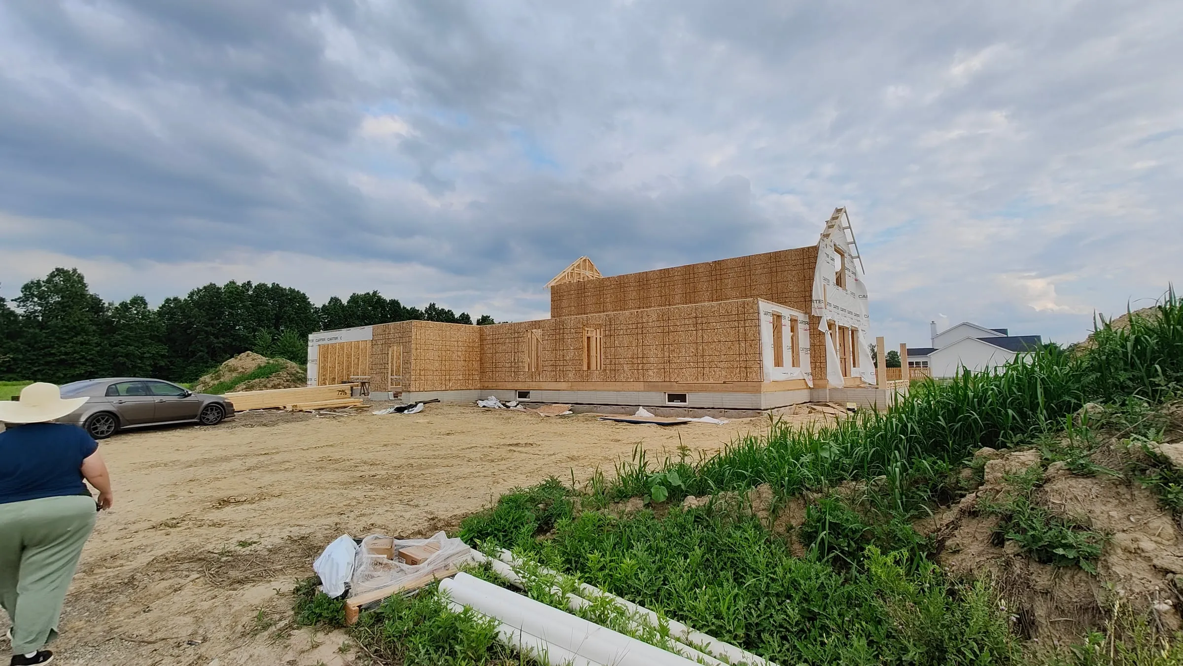 House framing under a cloudy sky