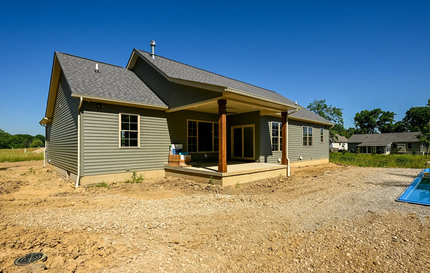 Rear elevation with a covered porch and timber posts