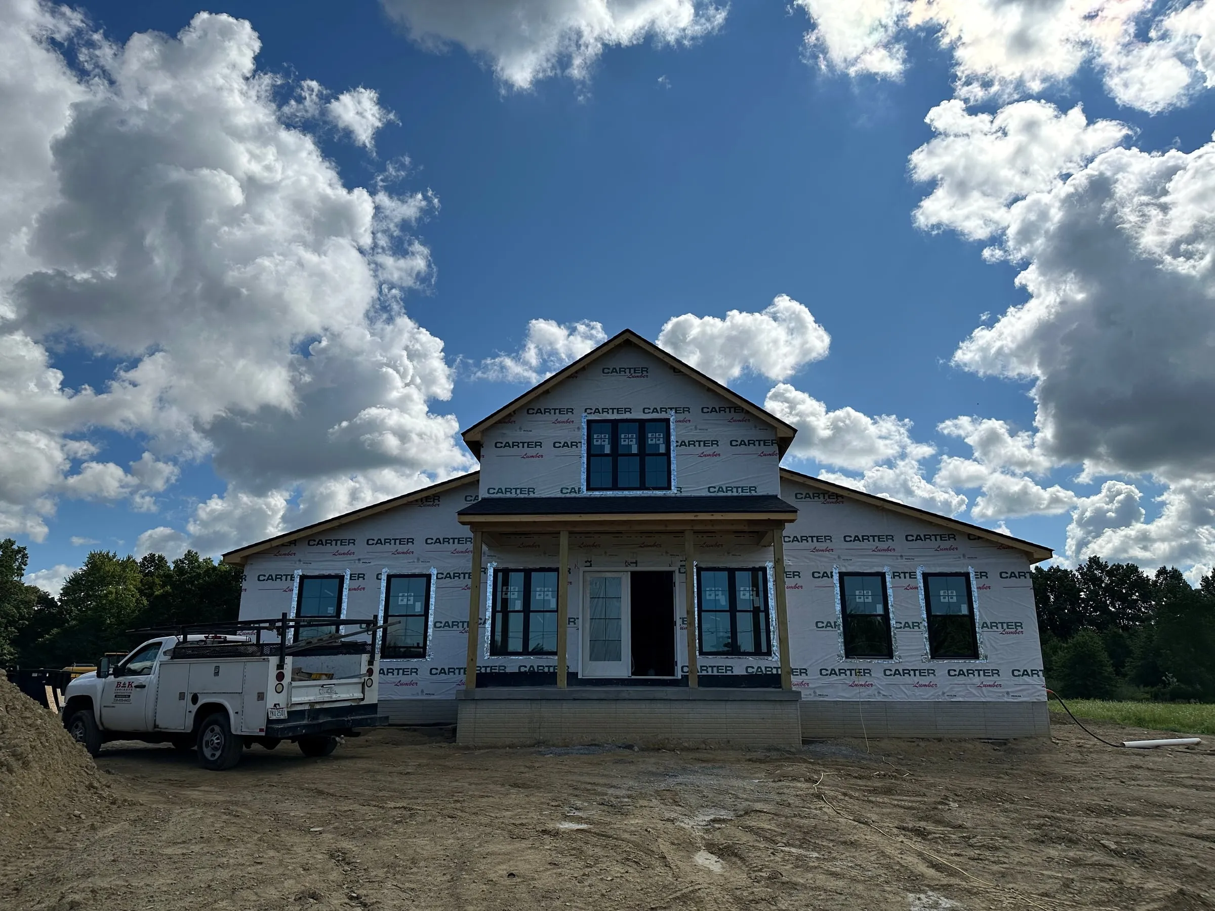 Wrapped home with the crew's trucks out front